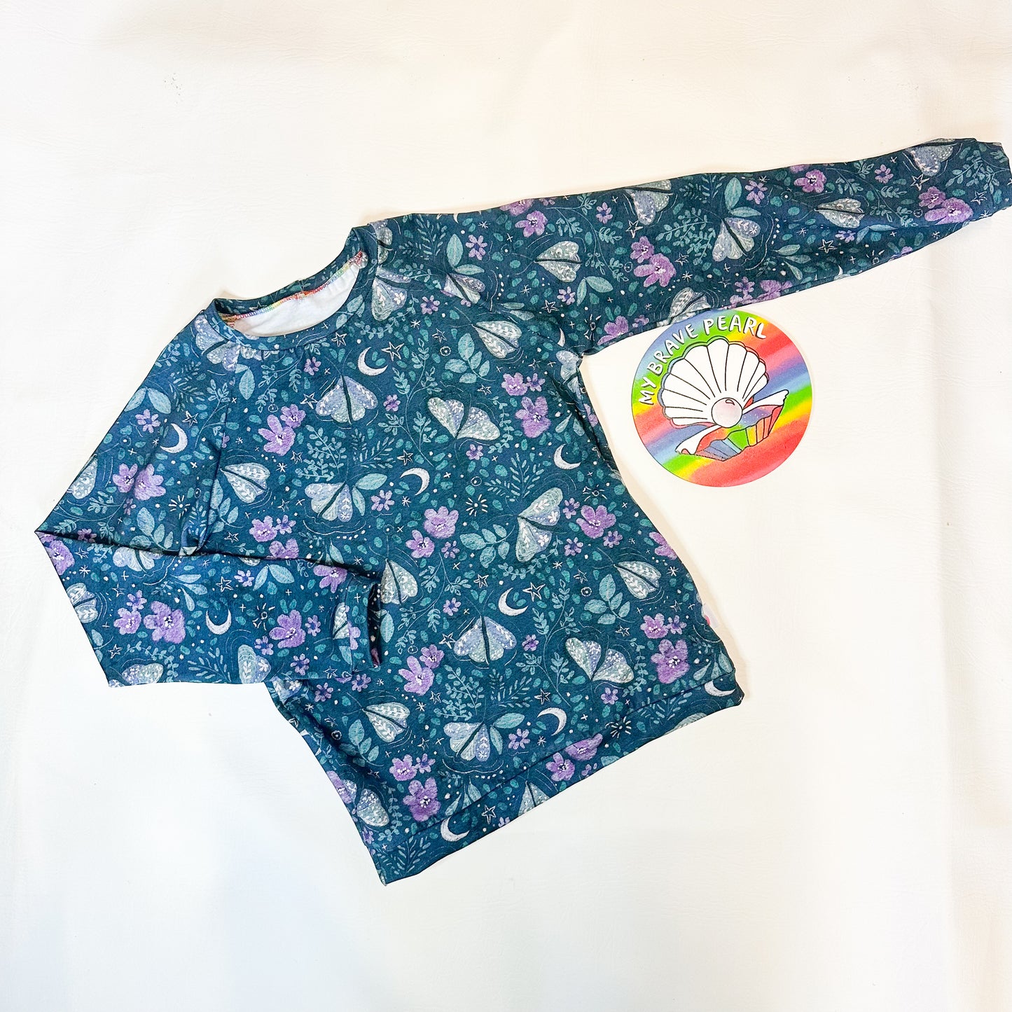 Ready To Ship 7-8Y Cadbury Teal Moths Long Sleeve Raglan Tee